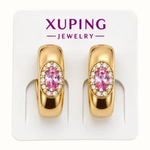 Aretes dorados con piedra rosa y cristales blancos